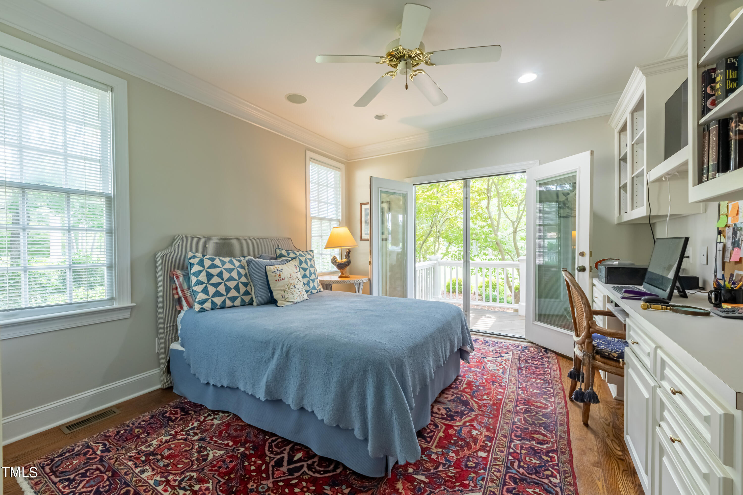 103 Declair Court Cary, NC 27513 - Photo 25 of 47 a bedroom with a bed a dresser and a chandelier