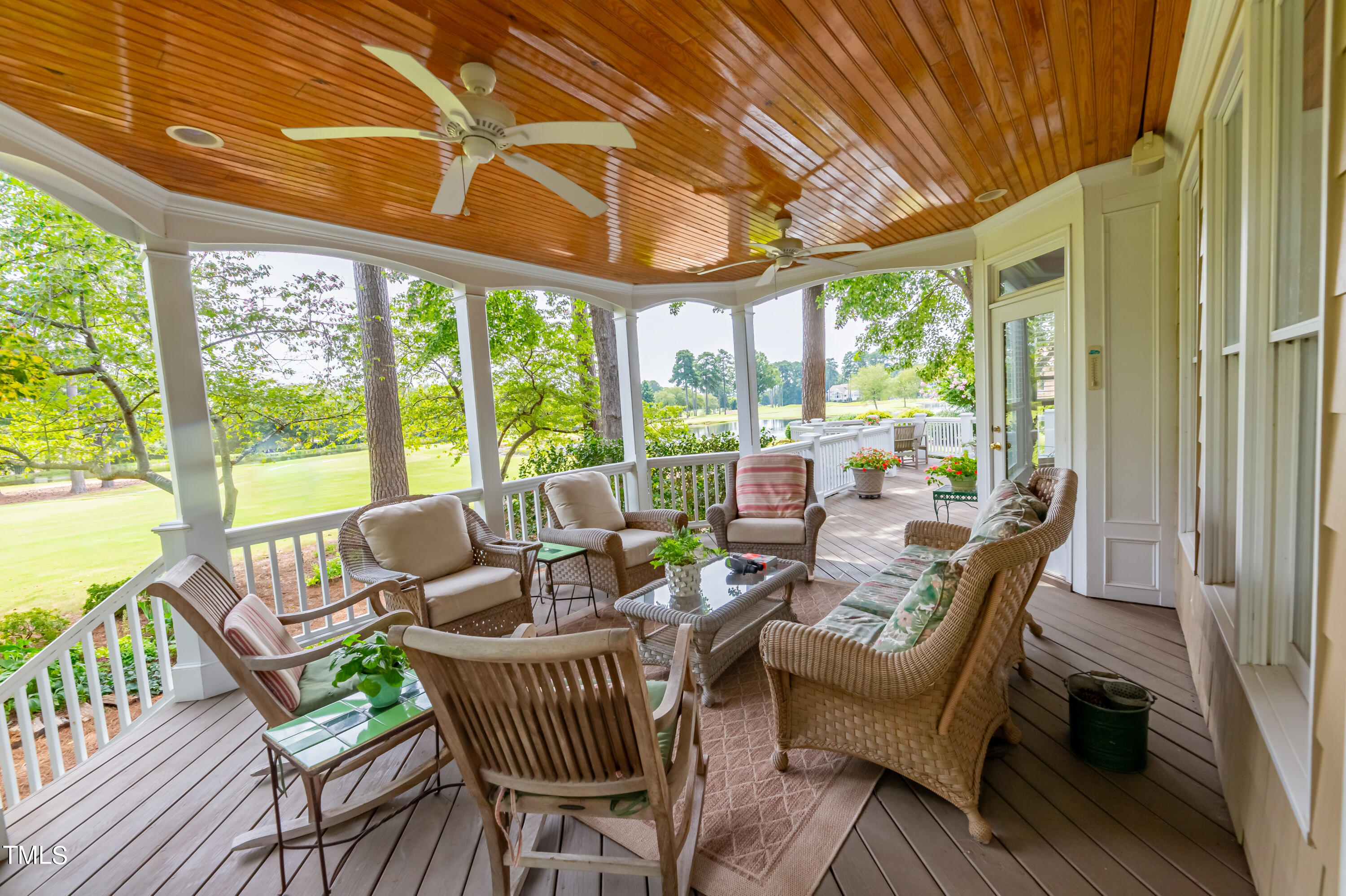 103 Declair Court Cary, NC 27513 - Photo 26 of 47 a dining room with furniture a flat screen tv and a large window
