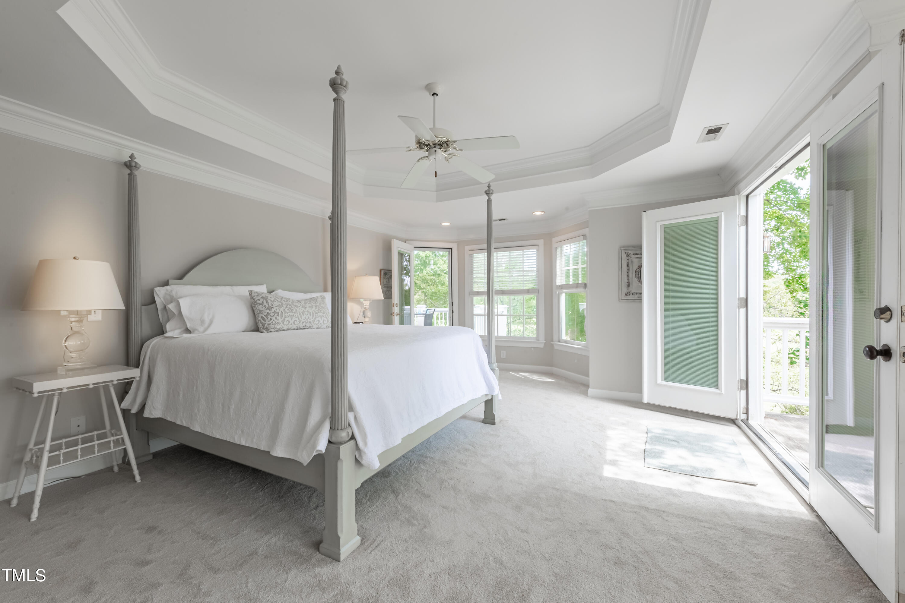 103 Declair Court Cary, NC 27513 - Photo 30 of 47 a large bed sitting in a room next to a window