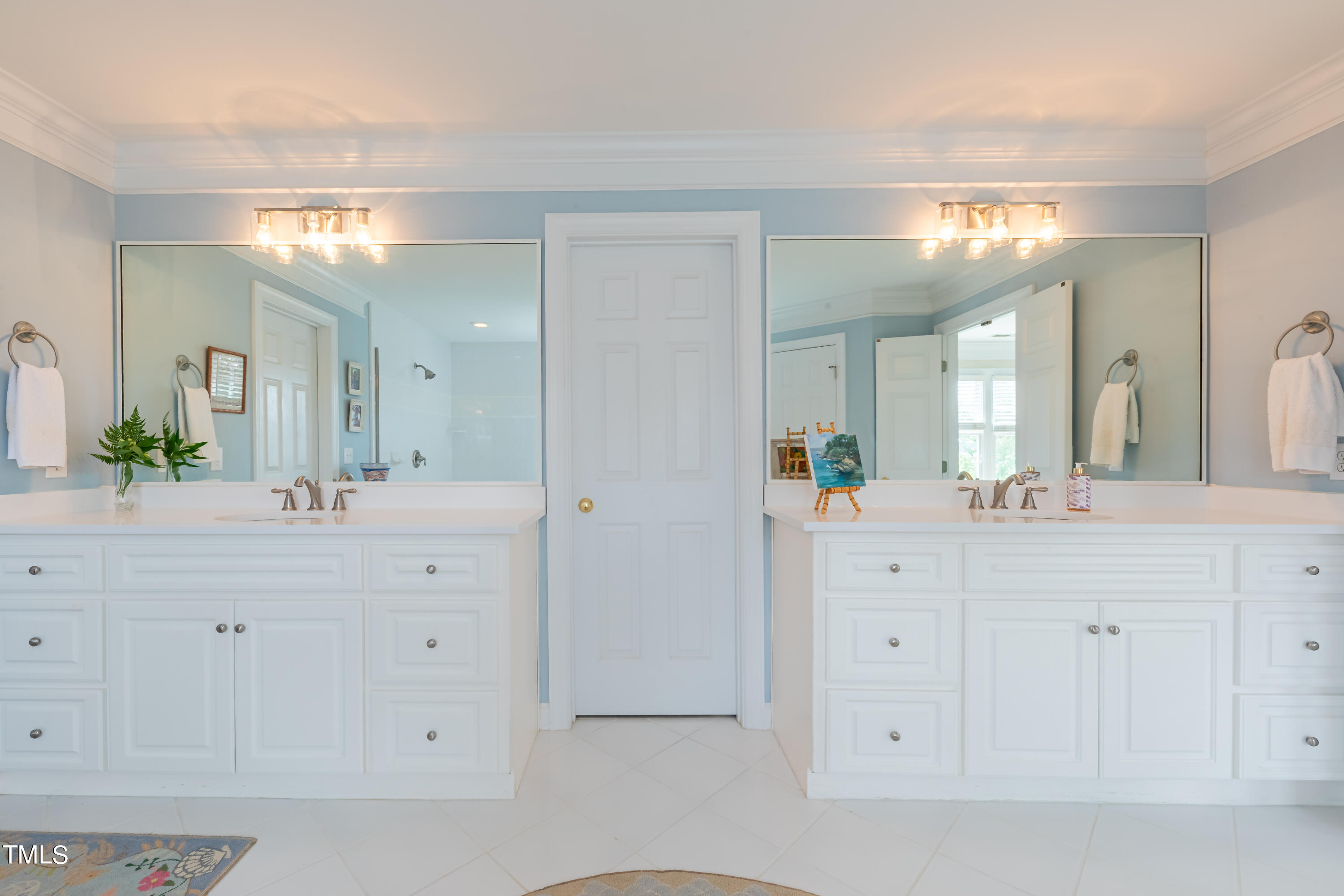 103 Declair Court Cary, NC 27513 - Photo 34 of 47 a spacious bathroom with double sink and a mirror