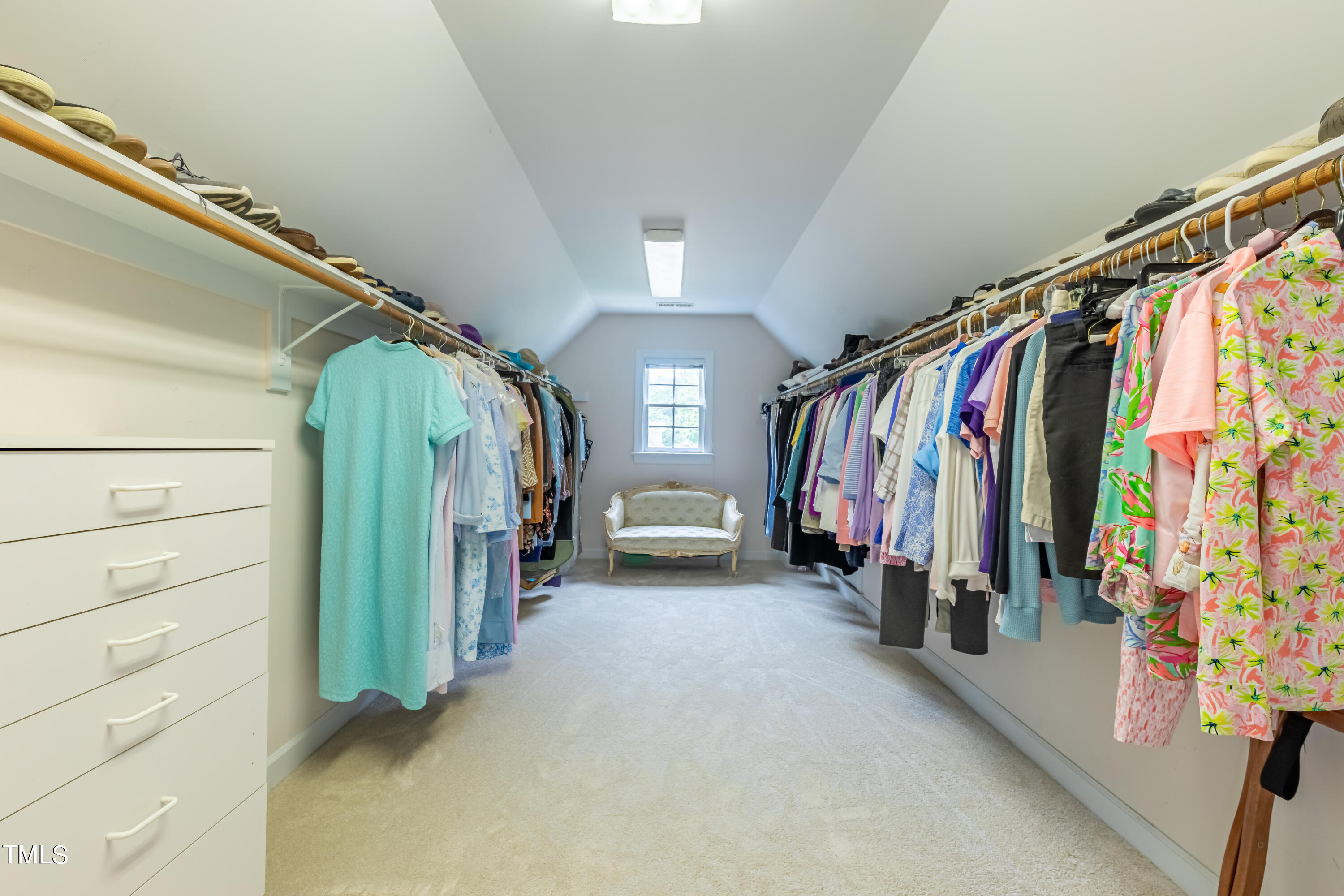 103 Declair Court Cary, NC 27513 - Photo 36 of 47 a view of walk in closet with clothes