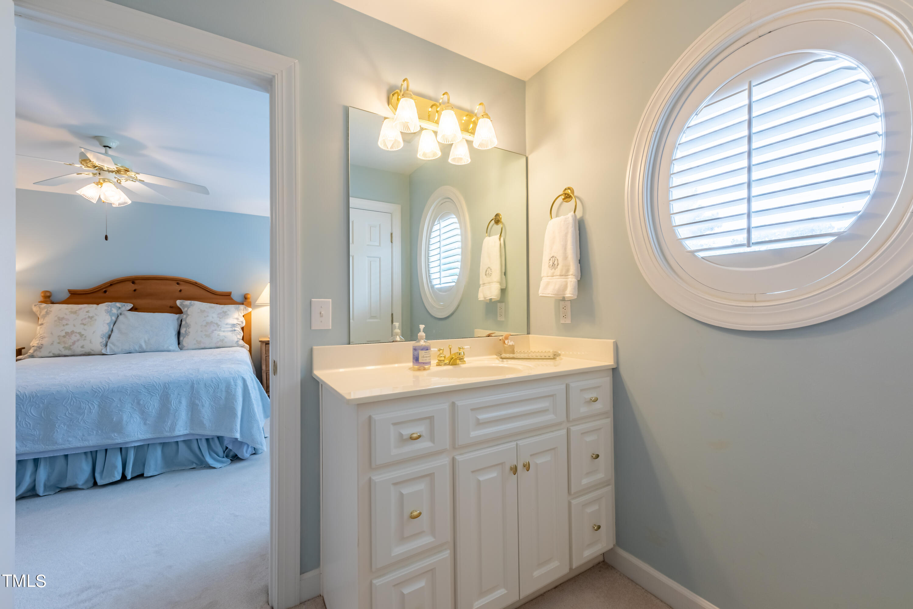 103 Declair Court Cary, NC 27513 - Photo 38 of 47 a spacious bathroom with a double vanity sink and a mirror