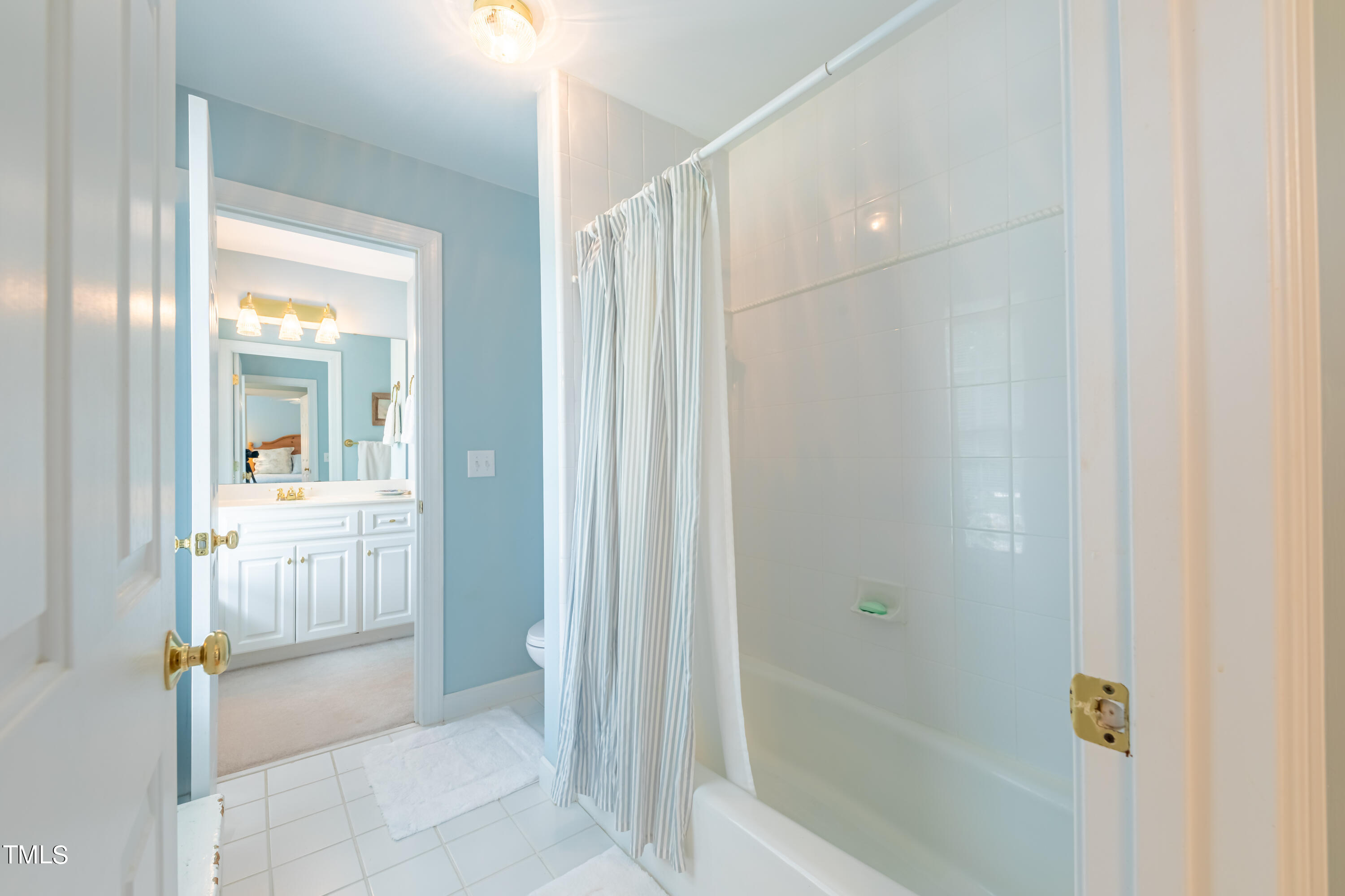 103 Declair Court Cary, NC 27513 - Photo 39 of 47 a bathroom with a shower and a tub