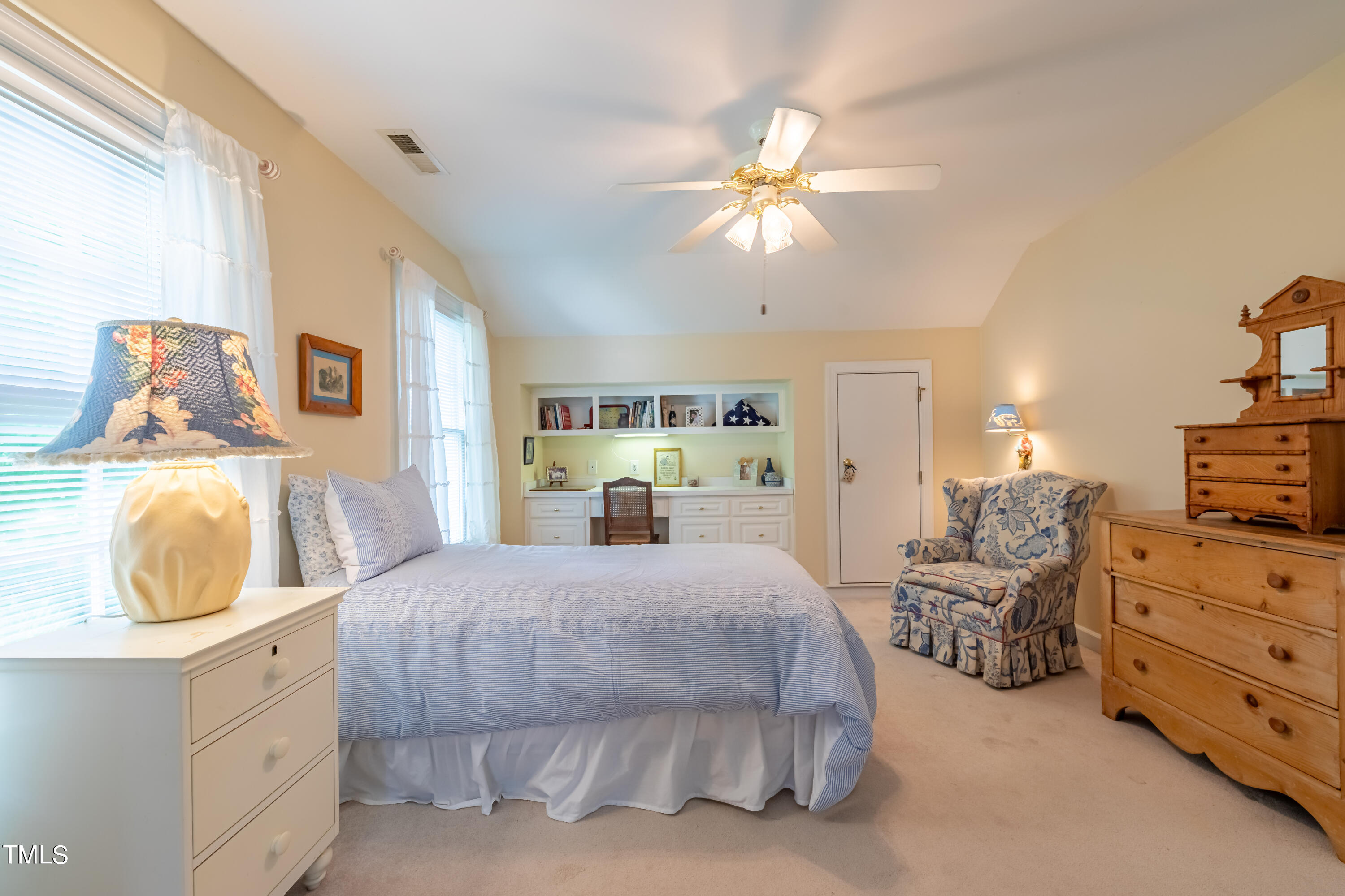 103 Declair Court Cary, NC 27513 - Photo 40 of 47 a bedroom with a bed and dresser