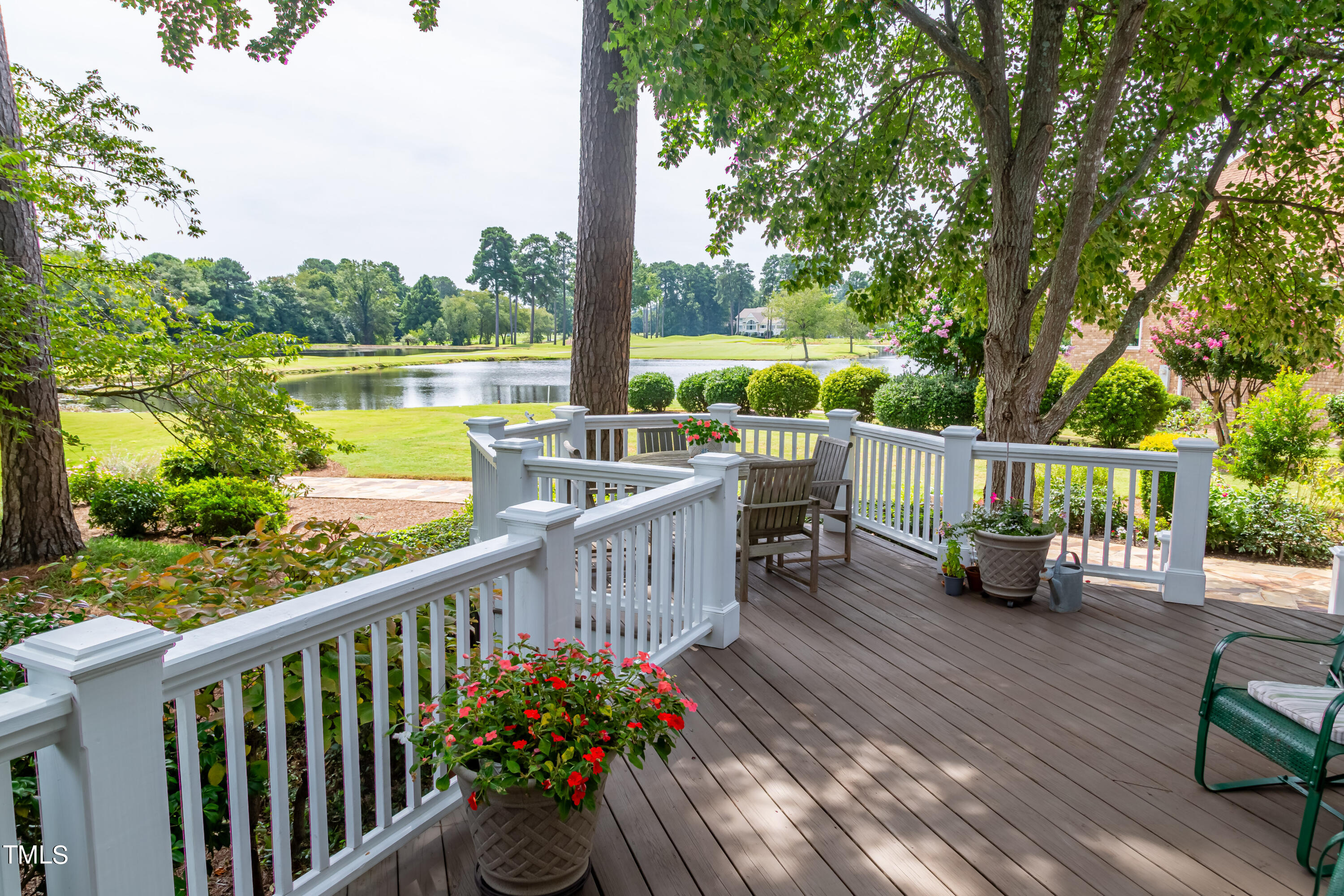 103 Declair Court Cary, NC 27513 - Photo 43 of 47 a view of a deck with couches chairs and wooden floor