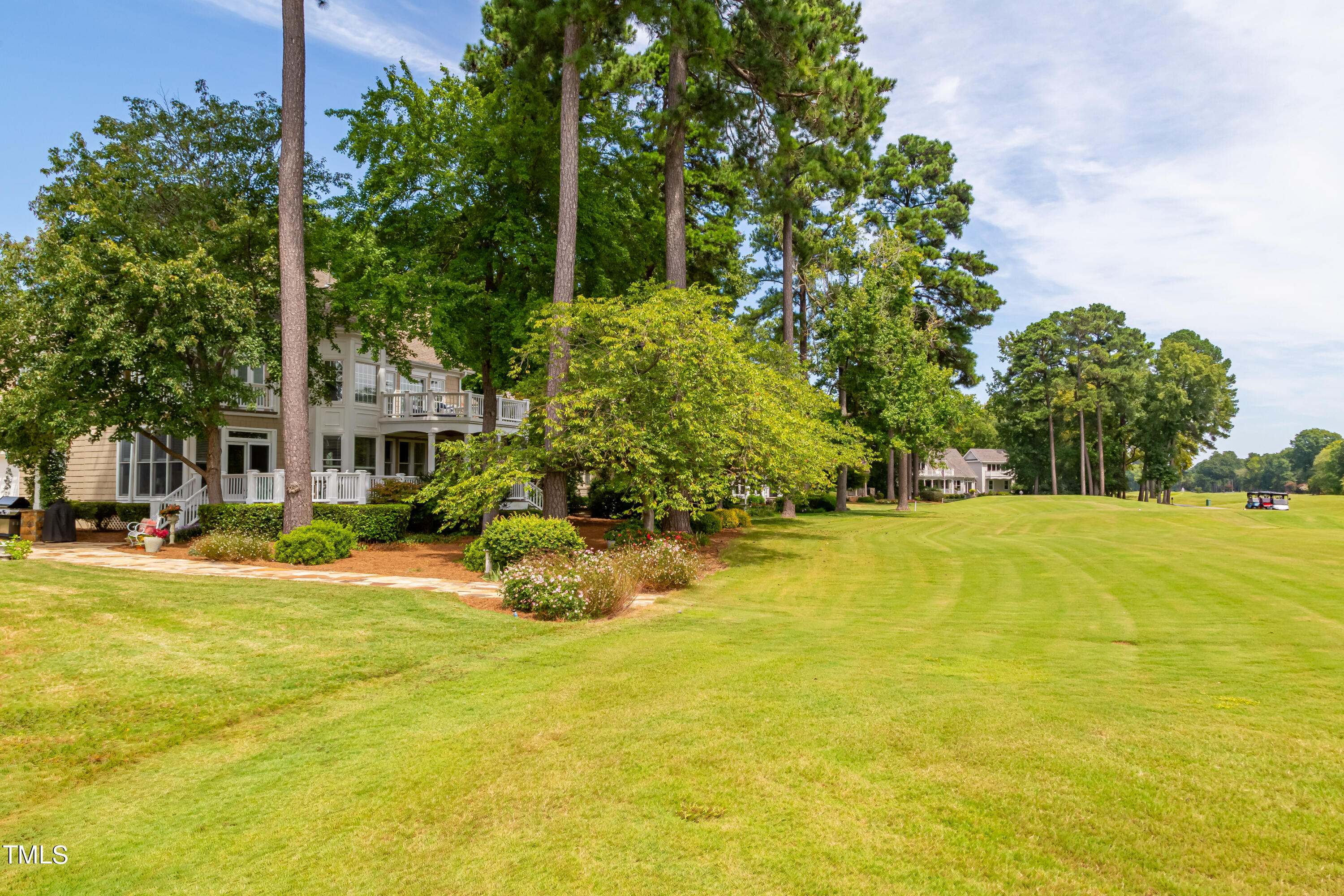 103 Declair Court Cary, NC 27513 - Photo 5 of 47 a view of a swimming pool with an outdoor space and seating area