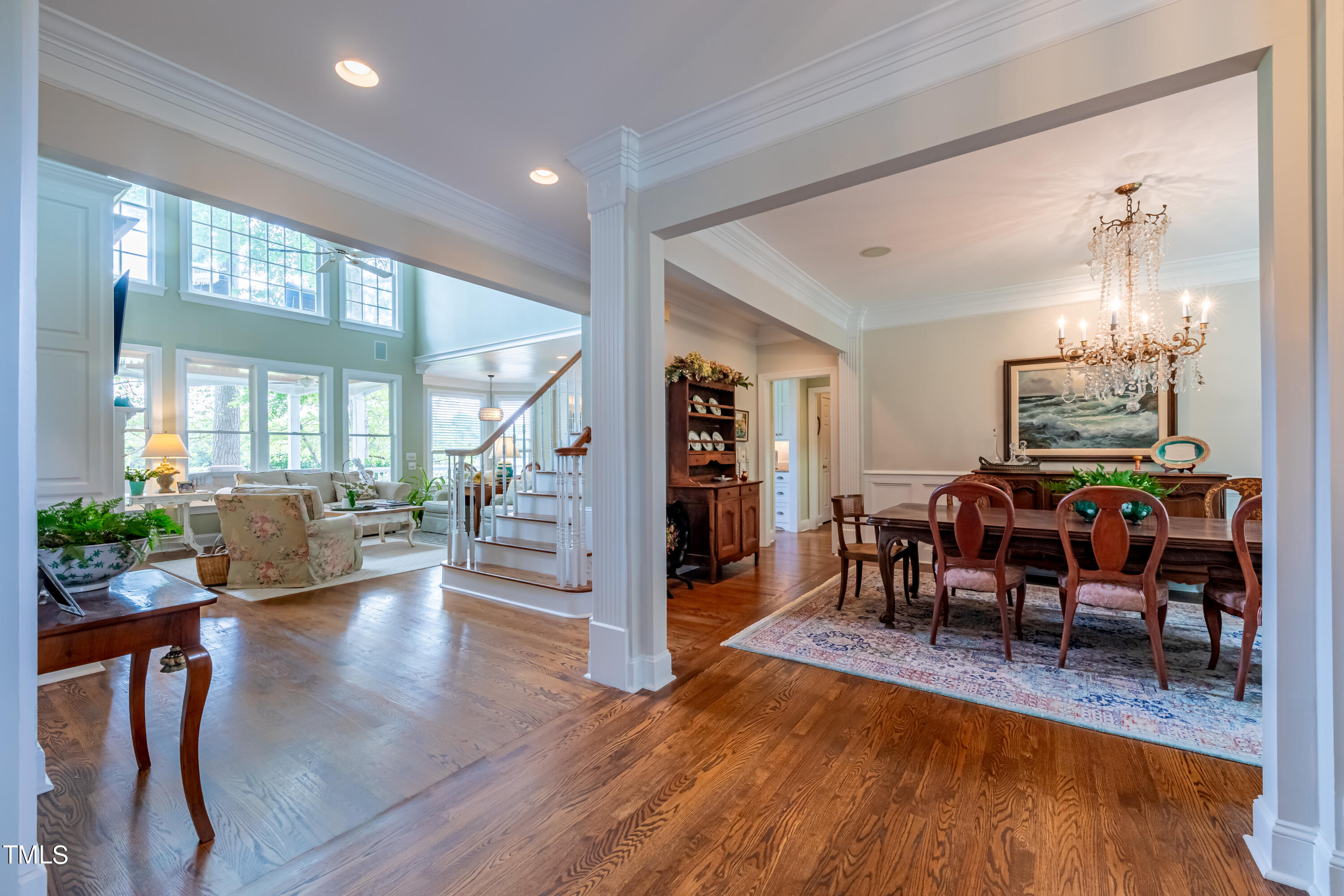 103 Declair Court Cary, NC 27513 - Photo 6 of 47 a living room with furniture dining table and wooden floor