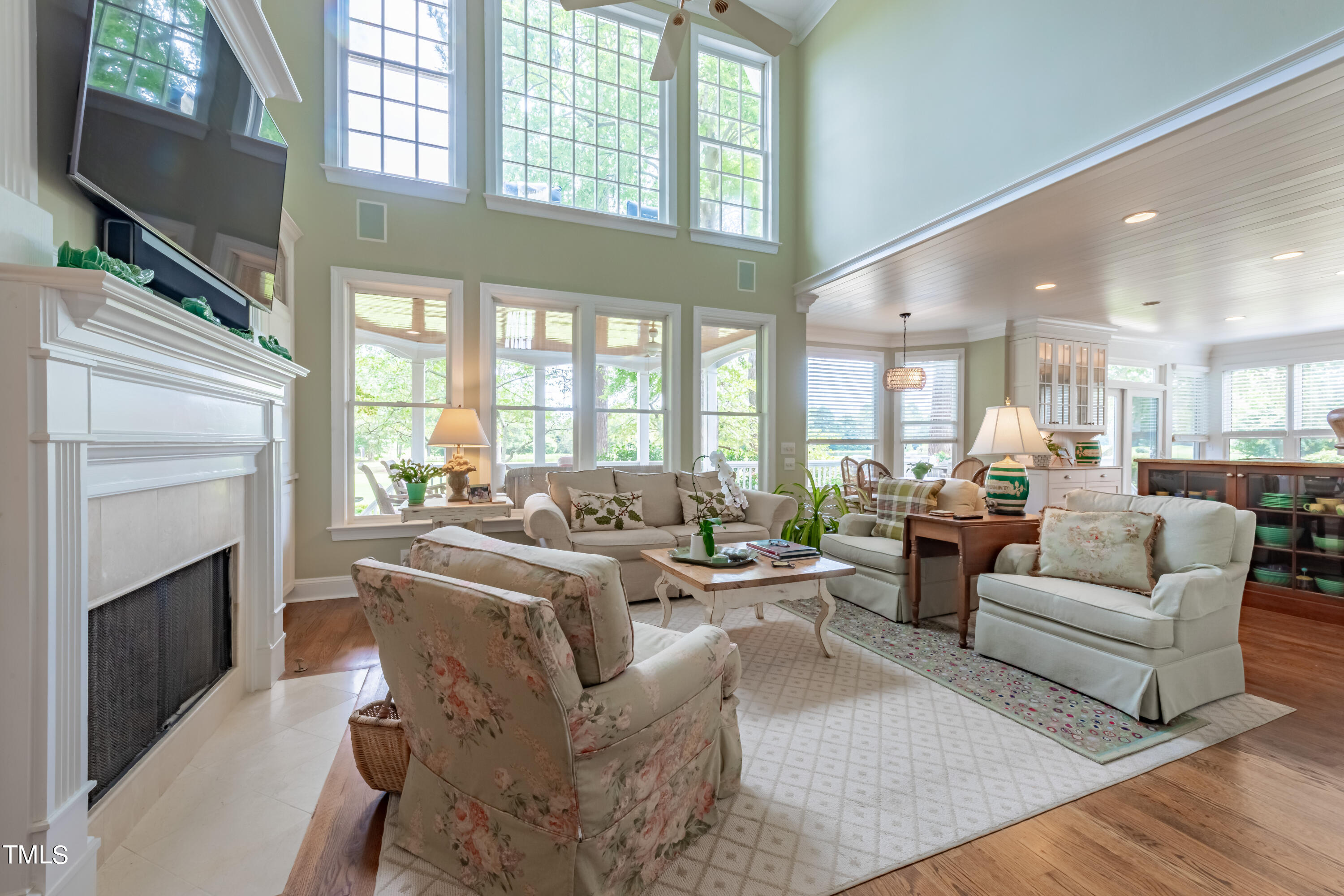 103 Declair Court Cary, NC 27513 - Photo 7 of 47 a living room with fireplace furniture and a flat screen tv