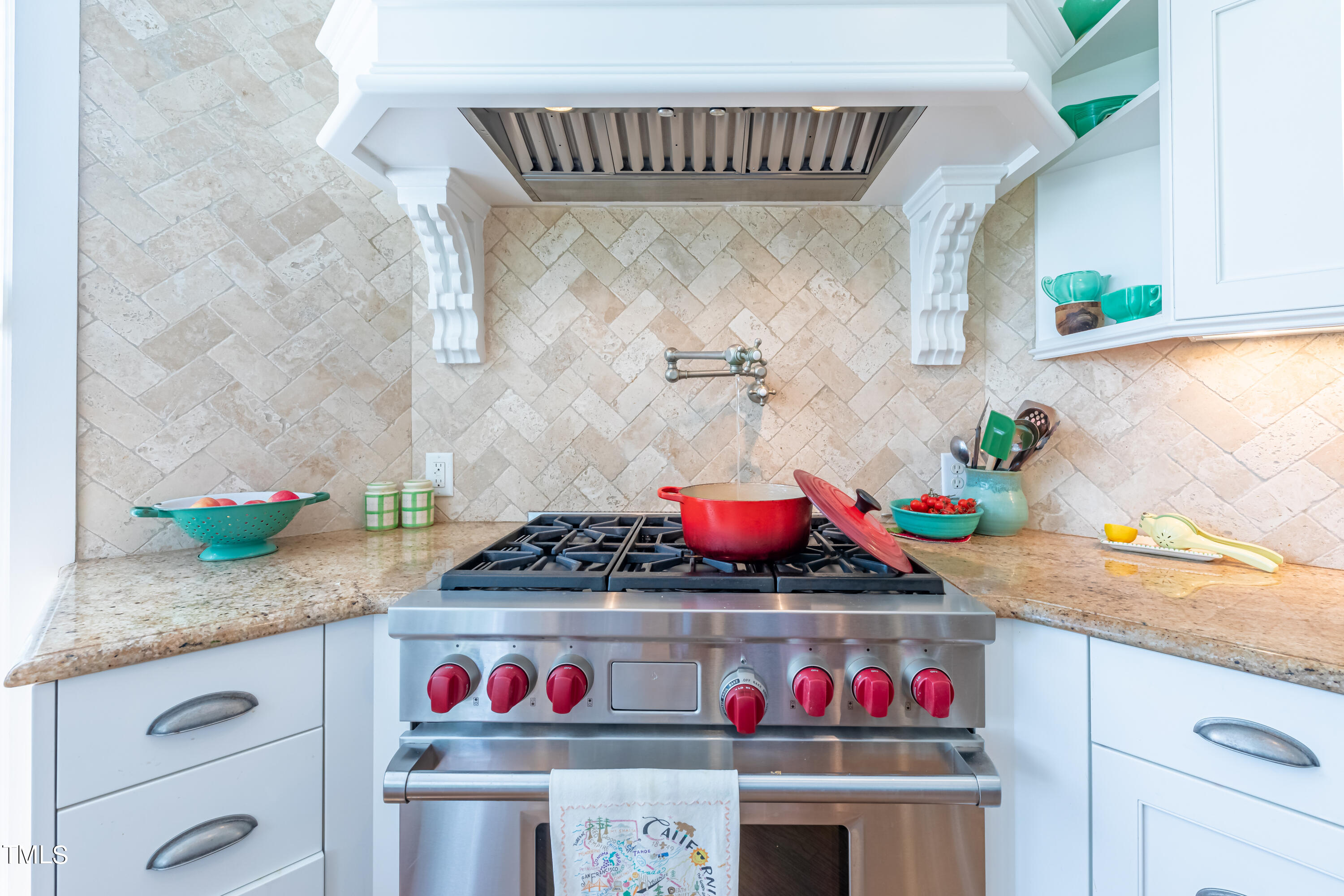 103 Declair Court Cary, NC 27513 - Photo 10 of 47 a kitchen with granite countertop lots of stainless steel appliances and a sink