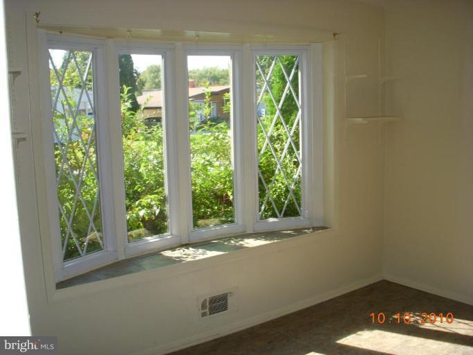 8518 Stevenswood Road Windsor Mill, MD 21244 - Photo 3 of 10 a view of room with window and front door