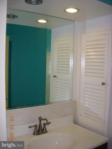 8518 Stevenswood Road Windsor Mill, MD 21244 - Photo 9 of 10 a bathroom with a bathtub
