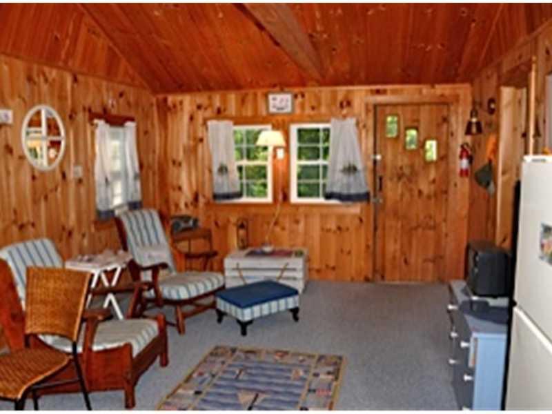4 Perkins Road New Harbor, ME 04554 - Photo 5 of 8 Living Room. Another view of the...