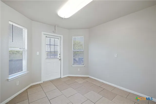 a view of an empty room with window