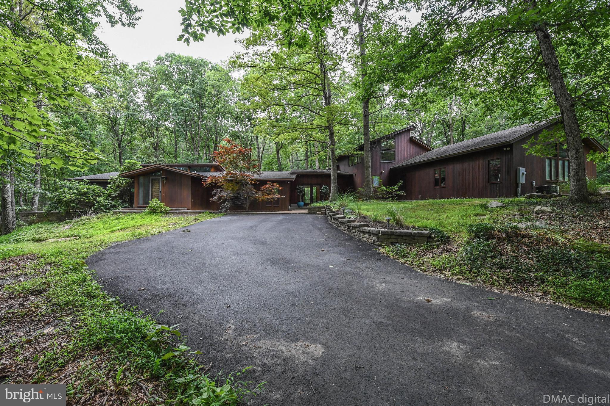 5429 Etzler Road Frederick, MD 21702 - Photo 1 of 61 Beautiful deck home located on private 9 acres