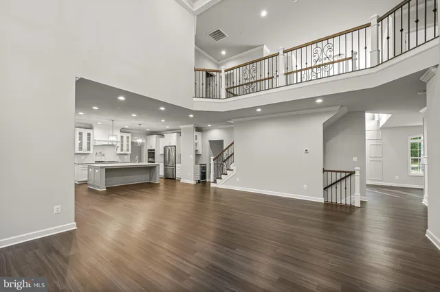 a view of a livingroom with wooden floor