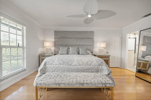 a living room with furniture and a lamp