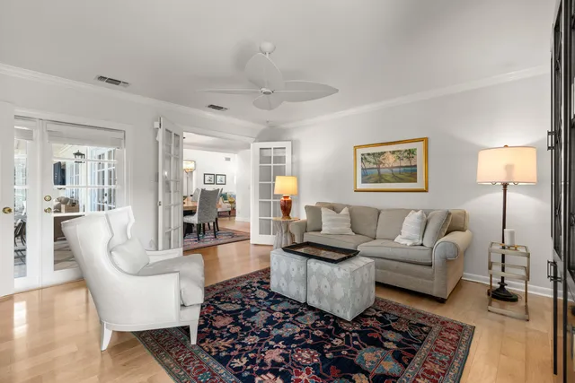 an aerial view of a house with a yard basket ball court and outdoor seating