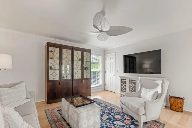 a view of a lake with houses in the background