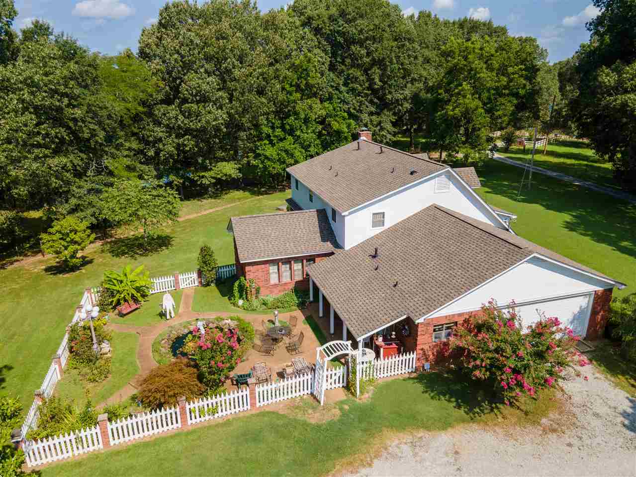 2375 Stanton Koko Road Stanton, TN 38069 - Photo 3 of 25 an aerial view of a house with a garden