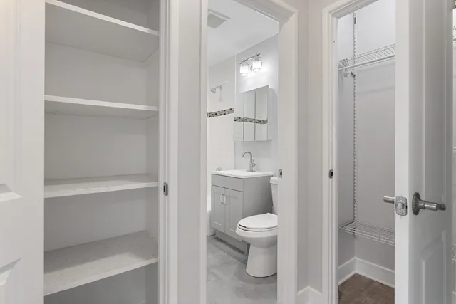 a bathroom with a toilet sink