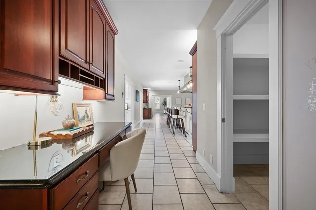 a kitchen with stainless steel appliances granite countertop a sink and cabinets