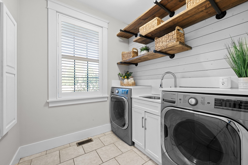 6 Brickyard Road Leicester, MA 01524 - Photo 15 of 41 a utility room with dryer and washer