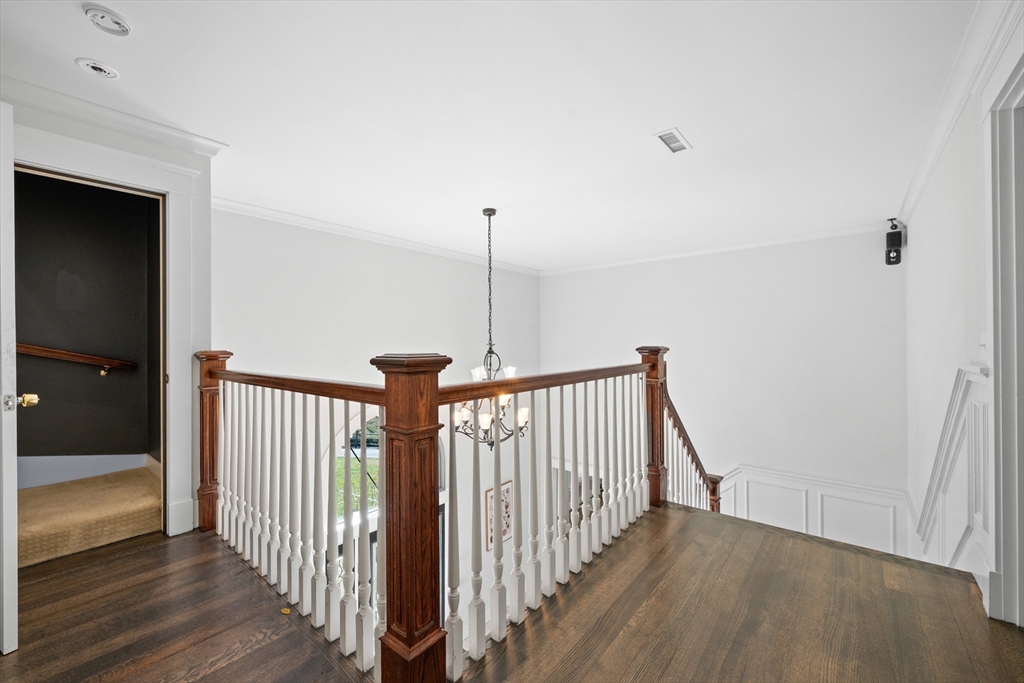 6 Brickyard Road Leicester, MA 01524 - Photo 19 of 41 a view of a hallway with wooden floor and stairs