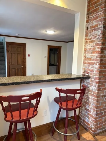 a room with chairs and a table