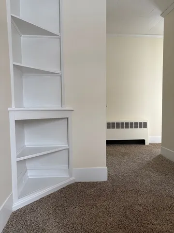 a view of a room with an empty space