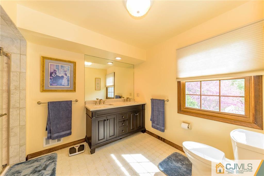 23 Covered Bridge Road Branchburg, NJ 08853 - Photo 15 of 25 a view of a kitchen with a sink and a window