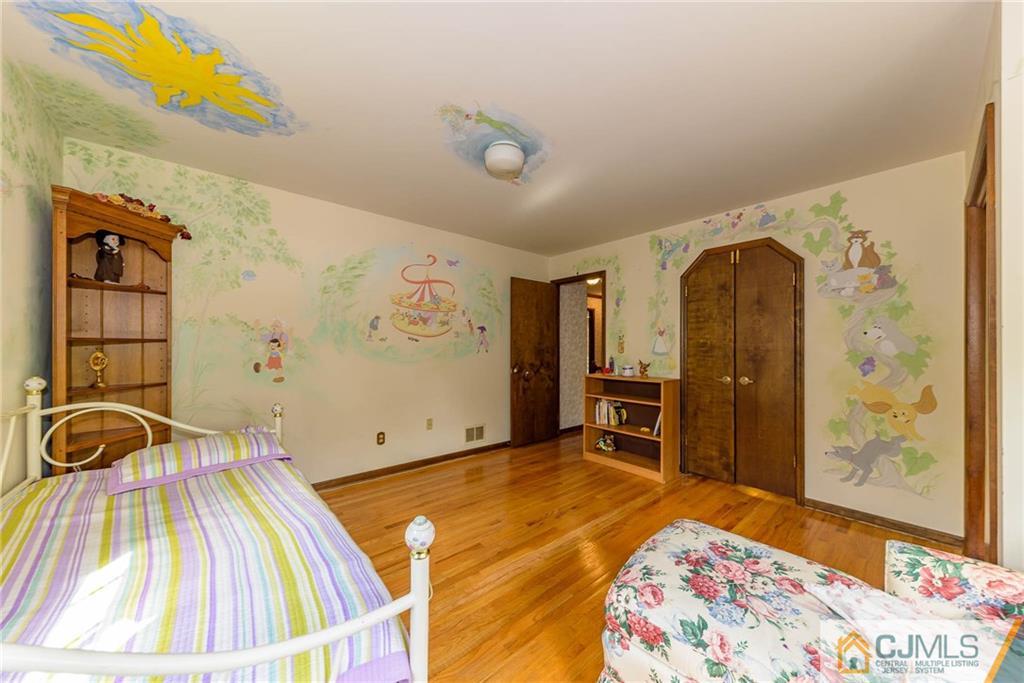 23 Covered Bridge Road Branchburg, NJ 08853 - Photo 19 of 25 a bedroom with a bed and a window