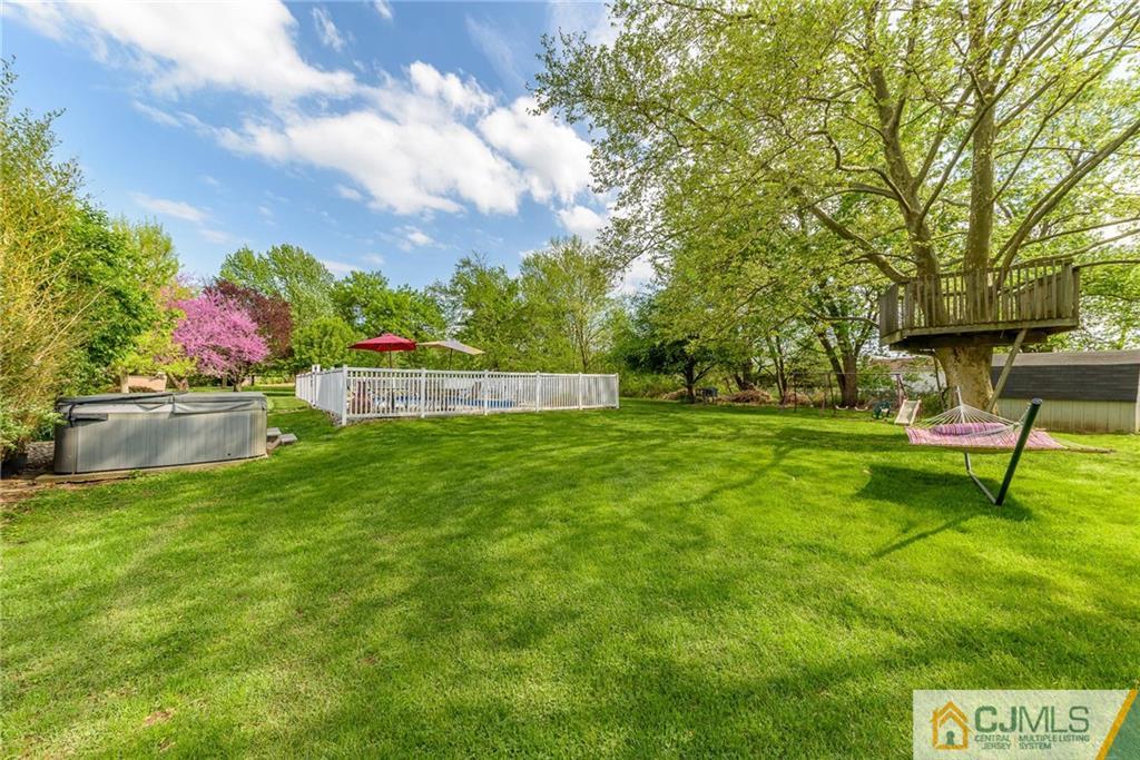 23 Covered Bridge Road Branchburg, NJ 08853 - Photo 24 of 25 a view of house with backyard