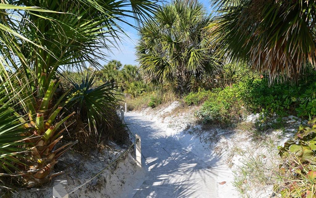 6285 Midnight Pass Road, Unit 403 Sarasota, FL 34242 - Photo 42 of 53 a view of a yard