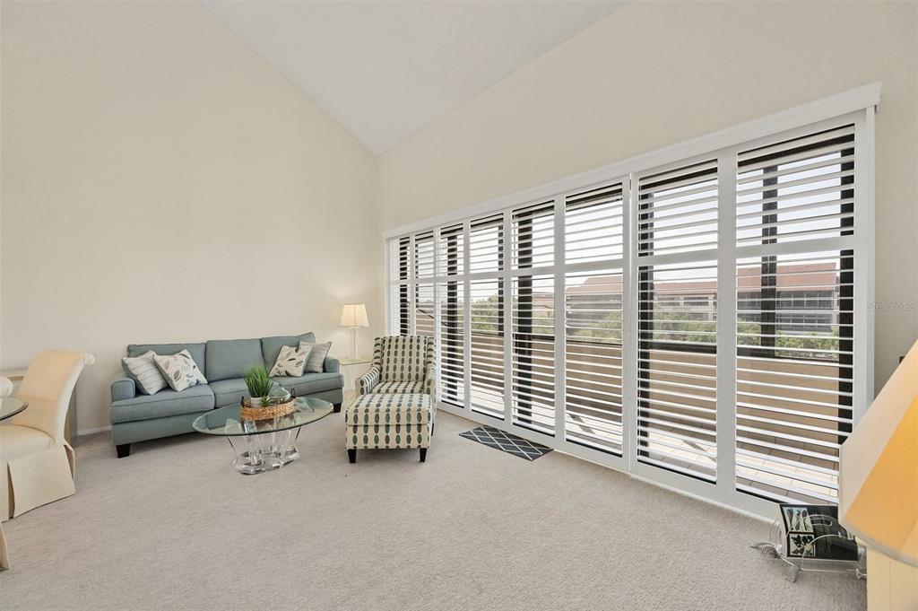 6285 Midnight Pass Road, Unit 403 Sarasota, FL 34242 - Photo 7 of 53 a view of livingroom with furniture and white walls