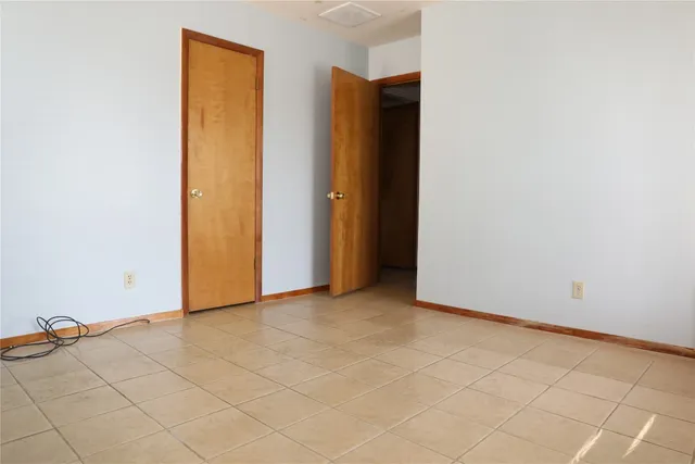 an empty room with a door