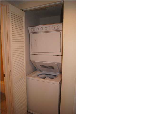 970 Highway 98, Unit 202 Destin, FL 32541 - Photo 17 of 26 a utility room with dryer and washer