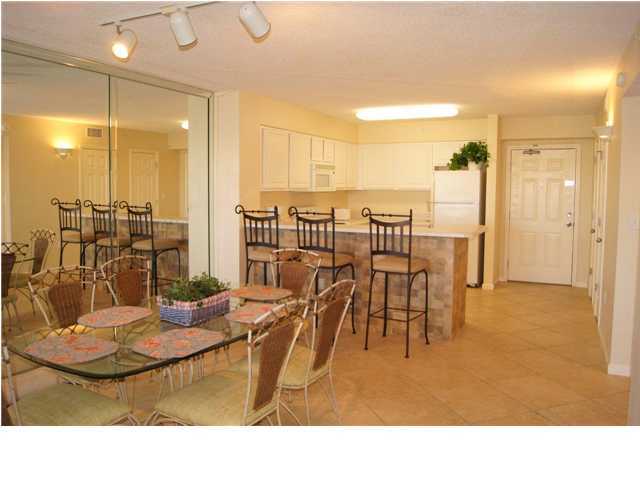 970 Highway 98, Unit 202 Destin, FL 32541 - Photo 20 of 26 a room with lots of chairs