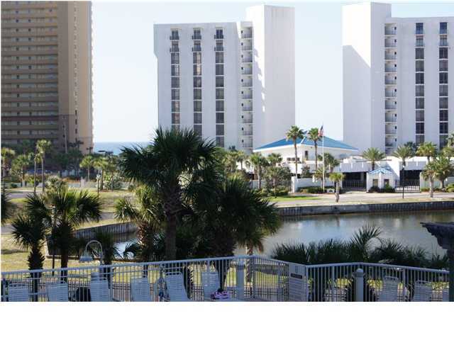970 Highway 98, Unit 202 Destin, FL 32541 - Photo 25 of 26 a view of swimming pool with outdoor seating and lake view