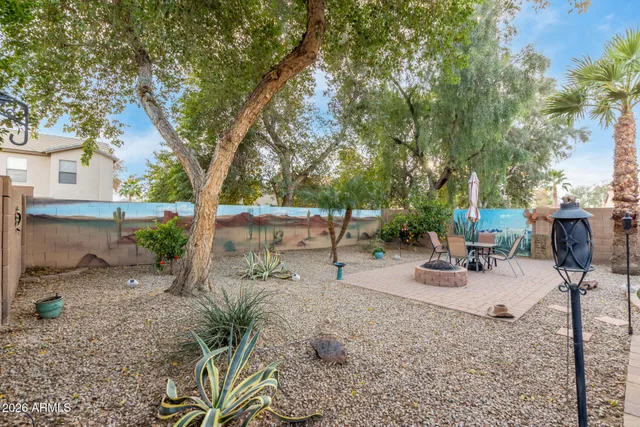 a view of a park with sitting area