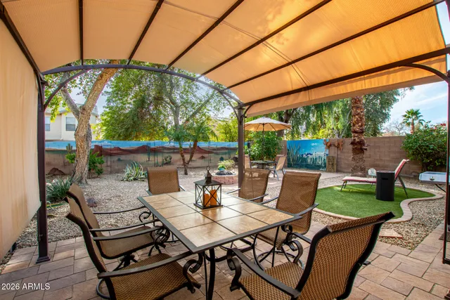 a view of an outdoor sitting area with a table