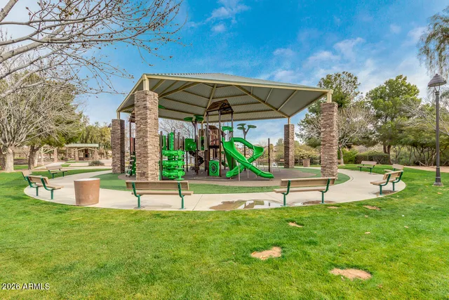 a view of a patio with a tree
