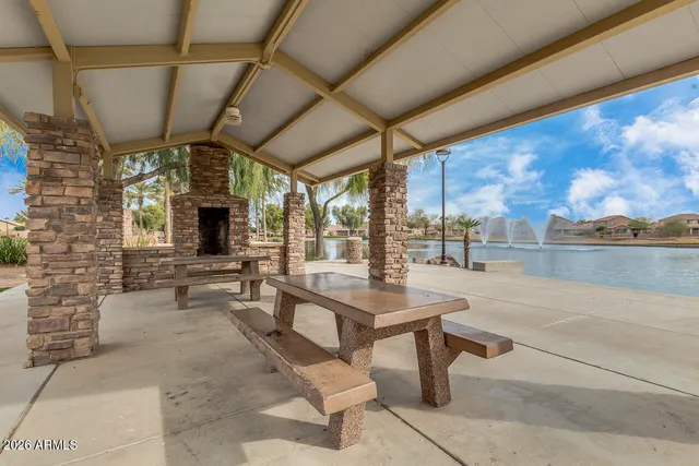 a view of houses with outdoor space and swimming pool