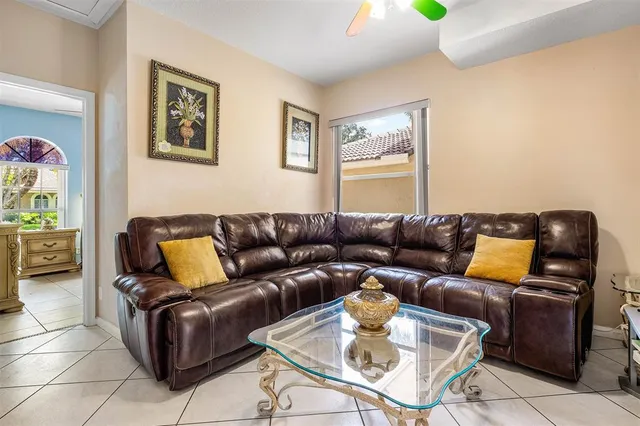 a living room with furniture and a couch