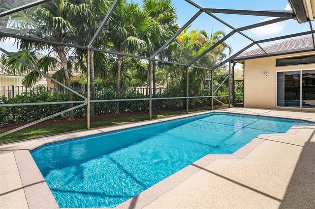 a view of a backyard with a small pool