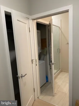 a bathroom with a shower and toilet