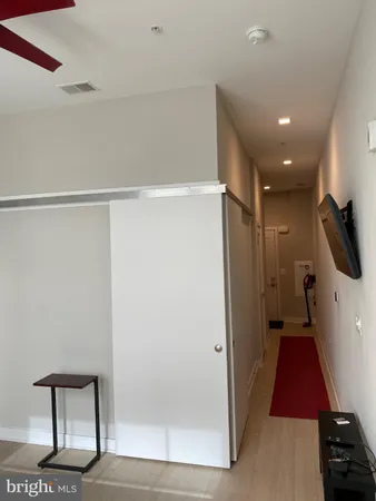 a bedroom with a bed and a cabinets