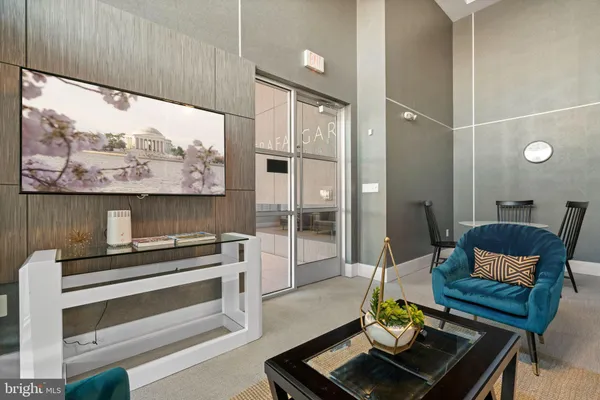 a living room with furniture and a couch