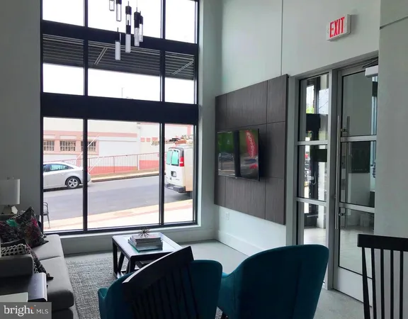 a view of an empty room with a fireplace