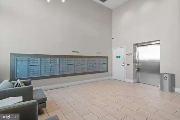a view of a hallway with large trees