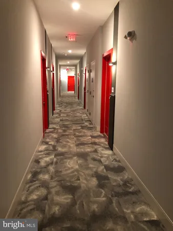 a view of hallway with shower